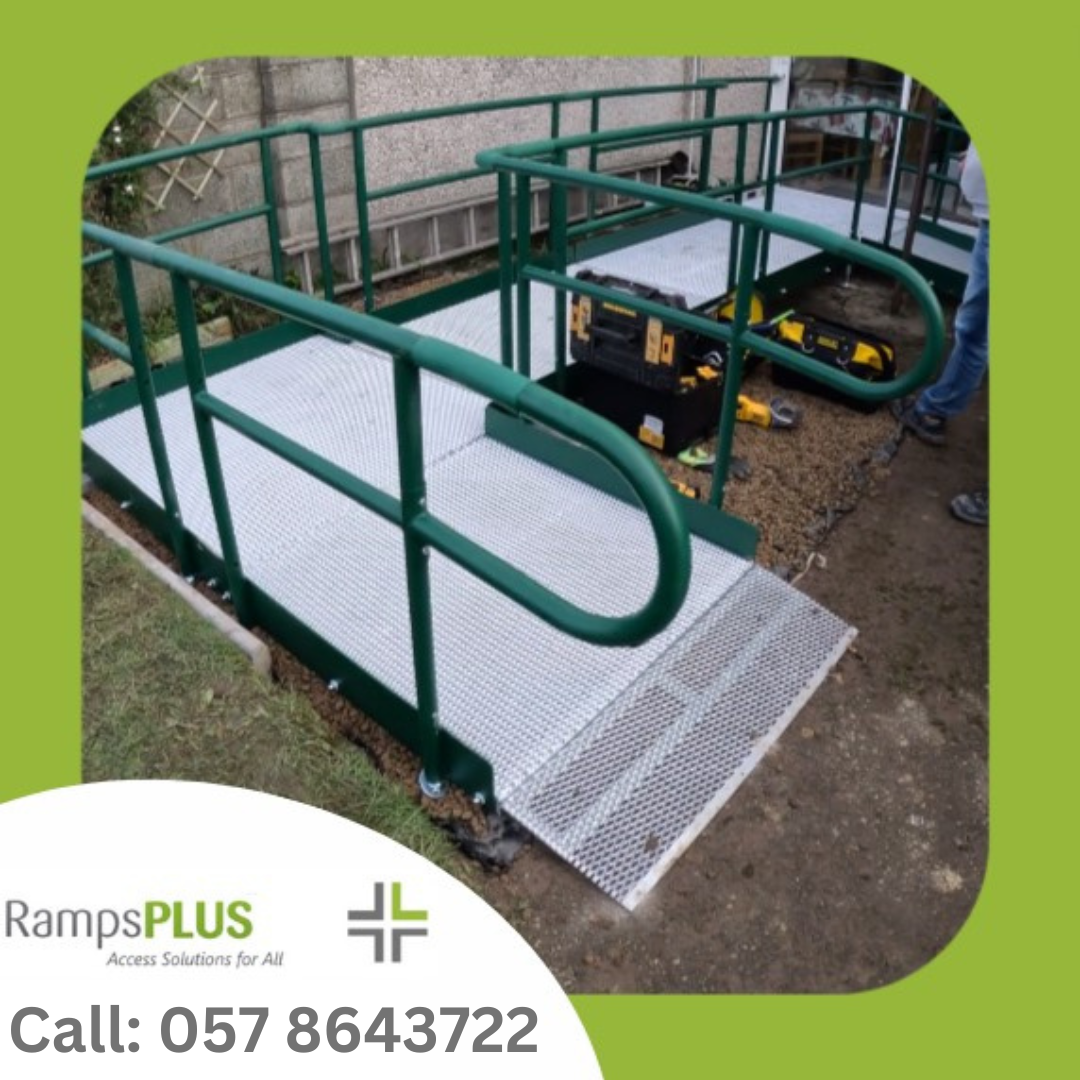 Mobility ramp installed in South Dublin. The ramp has green handrails on a metal platform