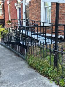 Modular ramp installed on a listed building with handrails