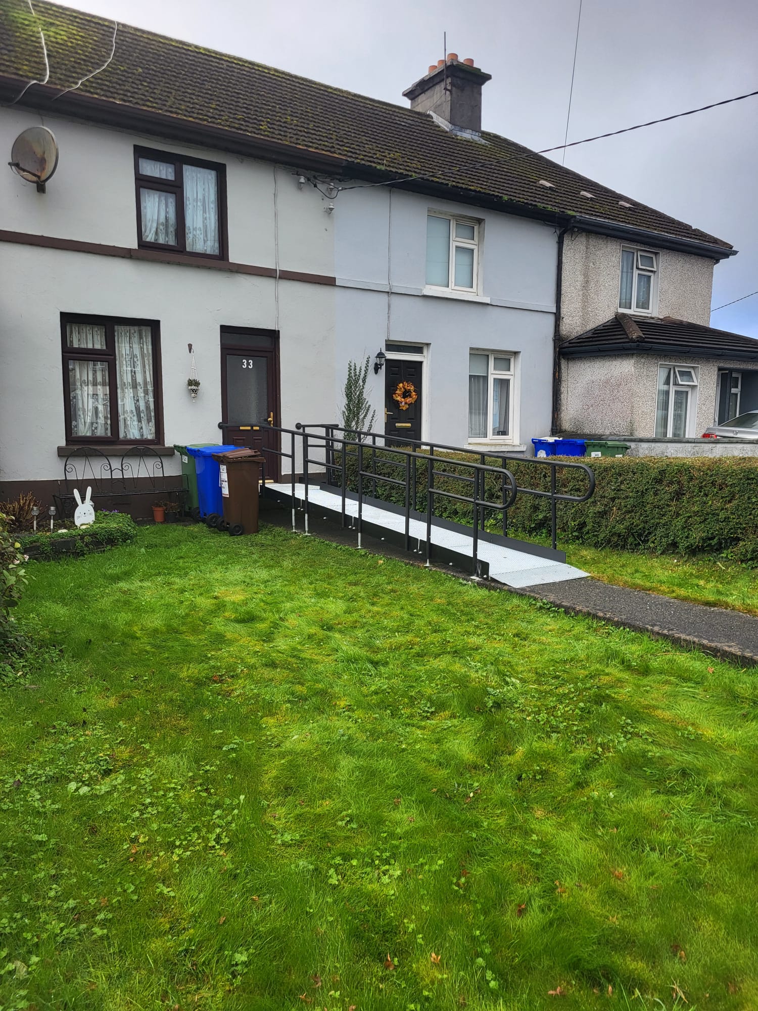 A long modular ramp at a front door