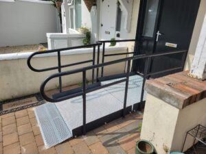 modular ramp with black handrails