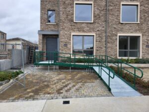 Modular wheelchair ramp at the front of a house